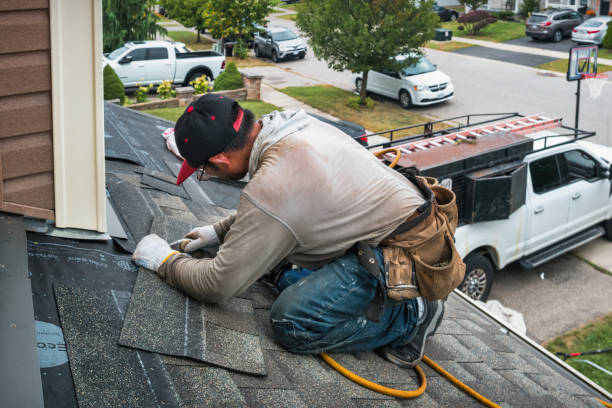 Professional Gutter Repair And Installation technician working in Monessen, PA
